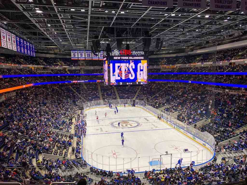 UBS Arena Guide: Best Seats, Parking & Tips for Islanders Games 4 Inside UBS Arena during a New York Islanders game with fans and players on the ice.